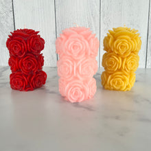 Load image into Gallery viewer, Bring timeless elegance and the warm glow of natural beeswax into your home with this handcrafted Rose Beeswax Pillar Candle. Beautifully sculpted with delicate rose petals, this stunning floral candle creates a cozy ambiance while showcasing the natural beauty of pure American beeswax.