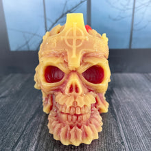 Load image into Gallery viewer, Make a bold statement with this Skull Beeswax Candle with Cross Crown, handcrafted from 100% pure American beeswax. This hauntingly detailed candle is the perfect addition to Halloween décor, gothic home décor, dark academia, witchy décor, haunted house displays, or spooky fall decorating.