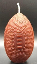Load image into Gallery viewer, Kick off football season in style with this Football Beeswax Candle, handcrafted from 100% pure beeswax. Whether you’re decorating for game day, hosting the ultimate tailgate, celebrating the big championship game, or searching for the perfect gift for your favorite football fan, this unique candle is sure to be a touchdown!