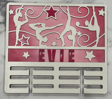 Load image into Gallery viewer, Celebrate your child’s achievements by displaying their metals on this beautiful award holder. This 15” award holder will prominently display at least 12 metals and can be customized with your child’s name and your choice of colors.