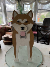 Load image into Gallery viewer, Bring some furry love to your home with our charming Shiba Inu Dog Planter.  Not only does it welcome guests with it's adorable design, but you can also add a custom dog tag with your pet's name for an extra personal touch (additional $5).  The perfect gift for dog lovers, this planter is sure to bring a smile to anyone's face.  Get yours now and show your love for man's best friend.
