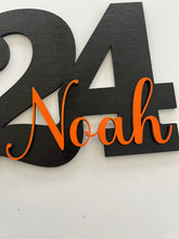 Load image into Gallery viewer, Celebrate your graduate with this personalized wooden graduation sign. An ideal alternative to a traditional guestbook, it features their graduation year, making it a great photo prop for the special day. Show your support in style with this meaningful keepsake.