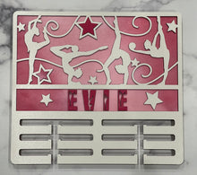 Load image into Gallery viewer, Celebrate your child’s achievements by displaying their metals on this beautiful award holder. This 15” award holder will prominently display at least 12 metals and can be customized with your child’s name and your choice of colors.