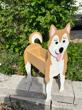 Load image into Gallery viewer, Bring some furry love to your home with our charming Shiba Inu Dog Planter.  Not only does it welcome guests with it's adorable design, but you can also add a custom dog tag with your pet's name for an extra personal touch (additional $5).  The perfect gift for dog lovers, this planter is sure to bring a smile to anyone's face.  Get yours now and show your love for man's best friend.