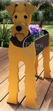 Load image into Gallery viewer, Bring some furry love to your home with our charming Airdale Dog Planter.  Not only does it welcome guests with it's adorable design, but you can also add a custom dog tag with your pet's name for an extra personal touch (additional $5).  The perfect gift for dog lovers, this planter is sure to bring a smile to anyone's face.  Get yours now and show your love for man's best friend.