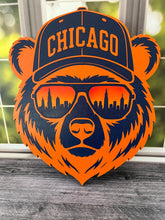 Load image into Gallery viewer, Show off your love for Chicago and hometown spirit with this bold bear sign! Featuring a cool bear dressed for chilly Chicago weather in a stocking cap and sunglasses, this layered design brings together classic orange and navy colors with unmistakable Windy City style.