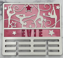 Load image into Gallery viewer, Celebrate your child’s achievements by displaying their metals on this beautiful award holder. This 15” award holder will prominently display at least 12 metals and can be customized with your child’s name and your choice of colors.