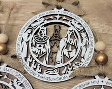 Load image into Gallery viewer, These beautiful Christmas Story Ornaments depict the story of Jesus and are sure to add to your holiday decor.  