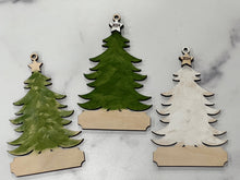 Load image into Gallery viewer, This beautiful Christmas Tree Personalized Ornament is sure to become a cherished, family favorite for years to come.  Add your loved ones and/or pets names to the ornaments on the tree to create a lasting keepsake.   Available in 3 different, hand painted styles and your choice of natural wood or colored ornaments.  Add a custom banner at the bottom to make it uniquely yours.  Please specify color of ornament and name when ordering.  