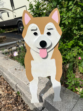 Load image into Gallery viewer, Bring some furry love to your home with our charming Shiba Inu Dog Planter.  Not only does it welcome guests with it's adorable design, but you can also add a custom dog tag with your pet's name for an extra personal touch (additional $5).  The perfect gift for dog lovers, this planter is sure to bring a smile to anyone's face.  Get yours now and show your love for man's best friend.