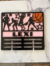 Load image into Gallery viewer, Celebrate your child’s achievements by displaying their metals on this beautiful award holder. This 15” award holder will prominently display at least 12 metals and can be customized with your child’s name and your choice of colors.