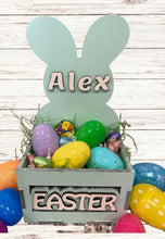 Load image into Gallery viewer, Make this Easter unforgettable with our Adorable Wood Crate Easter Basket, personalized with your child's name on top. Elevate the joy of the egg hunt and create lasting memories with these charming, customized Easter baskets designed just for your little ones.