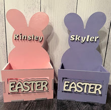 Load image into Gallery viewer, Make this Easter unforgettable with our Adorable Wood Crate Easter Basket, personalized with your child's name on top. Elevate the joy of the egg hunt and create lasting memories with these charming, customized Easter baskets designed just for your little ones.