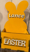 Load image into Gallery viewer, Make this Easter unforgettable with our Adorable Wood Crate Easter Basket, personalized with your child's name on top. Elevate the joy of the egg hunt and create lasting memories with these charming, customized Easter baskets designed just for your little ones.