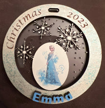 Load image into Gallery viewer, Add your picture to these adorable ornaments to create a treasured family keepsake.  You choose the wording around the outside, or add a name.  The possibilities are endless!
