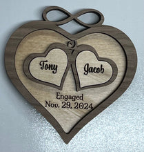 Load image into Gallery viewer, This beautiful Love Ornament can be customized with the couple's names and wedding or engagement date to create a lasting keepsake that will be treasured for years to come.  