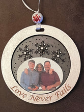 Load image into Gallery viewer, Add your picture to these adorable ornaments to create a treasured family keepsake.  You choose the wording around the outside, or add a name.  The possibilities are endless!