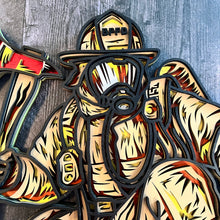Load image into Gallery viewer, Honor the bravery, strength, and dedication of a firefighter with this striking 4-layer wooden firefighter sign. Featuring a firefighter in full turnout gear and breathing apparatus, kneeling beside a detailed fire axe, this piece captures the courage and determination of those who answer the call.