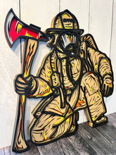 Load image into Gallery viewer, Honor the bravery, strength, and dedication of a firefighter with this striking 4-layer wooden firefighter sign. Featuring a firefighter in full turnout gear and breathing apparatus, kneeling beside a detailed fire axe, this piece captures the courage and determination of those who answer the call.