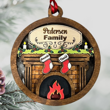 Load image into Gallery viewer, Our exquisite Fireplace Ornament with Personalized Stockings & Family Name on mantle – the perfect addition to your holiday décor that captures the essence of family warmth and festive joy. Transform your Christmas tree into a cherished symbol of togetherness with this beautifully crafted keepsake ornament.