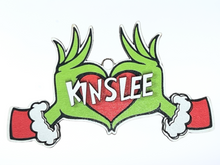Load image into Gallery viewer, Embrace the humor and charm of the holiday season with our delightful Grouch Hands & Heart Personalized Ornaments – the ultimate gift for the Grouch in your life. Measuring approximately 5" wide x 2.5" long, these ornaments pack a punch of personality and are sure to bring a smile to anyone with a touch of the grumpies.