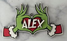 Load image into Gallery viewer, Embrace the humor and charm of the holiday season with our delightful Grouch Hands & Heart Personalized Ornaments – the ultimate gift for the Grouch in your life. Measuring approximately 5" wide x 2.5" long, these ornaments pack a punch of personality and are sure to bring a smile to anyone with a touch of the grumpies.