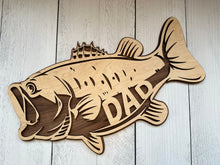 Load image into Gallery viewer, Reel in the perfect gift for the fishing enthusiast in your life with our incredible Large Mouth Bass DAD sign. Crafted with passion and attention to detail, this unique piece is a tribute to the angler who holds a special place in your heart. Surprise and delight your favorite fisherman with a personalized touch – also available with GRANDPA, PAPA, or UNCLE.