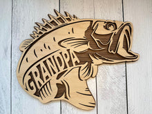 Load image into Gallery viewer, Reel in the ideal gift for the avid fisherman in your life with our stunning Large Mouth Bass Sign. This customizable masterpiece allows you to hook the perfect present by choosing from options like "Dad," "Grandpa," "Papa," "Uncle," or leaving it blank for a timeless touch. Additionally, we offer the option to add custom text, ensuring a truly personalized and thoughtful gift.