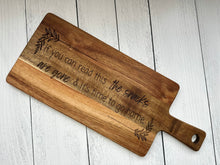 Load image into Gallery viewer, This exquisite Acacia Wood Cutting Board, a versatile and stylish addition to your kitchen or entertaining space. Crafted from high-quality acacia wood, this cutting board not only provides a durable surface for all your slicing and dicing needs but also doubles as a charming charcuterie board for serving appetizers with flair.