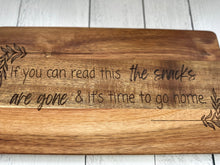 Load image into Gallery viewer, This exquisite Acacia Wood Cutting Board, a versatile and stylish addition to your kitchen or entertaining space. Crafted from high-quality acacia wood, this cutting board not only provides a durable surface for all your slicing and dicing needs but also doubles as a charming charcuterie board for serving appetizers with flair.