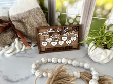 Load image into Gallery viewer, This gorgeous Family Tree Sign is a beautiful and meaningful way to celebrate and honor your family heritage.  This personalized frame can be customized with up to 25 names, allowing you to create a unique and special representation of your family.