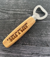 Load image into Gallery viewer, Pop open your favorite beverage in style with our engraved wood-handled bottle openers! Crafted with a durable stainless steel opener and a smooth wooden handle, these openers offer a comfortable grip and a sleek, rustic look.