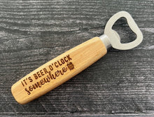Load image into Gallery viewer, Pop open your favorite beverage in style with our engraved wood-handled bottle openers! Crafted with a durable stainless steel opener and a smooth wooden handle, these openers offer a comfortable grip and a sleek, rustic look.