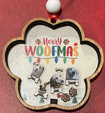 Load image into Gallery viewer, Make sure your fur babies know how much you love them with their own Paw Print Ornament.  This adorable shaker style ornament reads Merry Woofmas at the top & features images of your very own pets.  