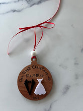 Load image into Gallery viewer, Celebrate your new union with this Our First Christmas As Mr. & Mrs. Ornament! Also available in Mrs. & Mrs. or Mr. & Mr. options. Adorable ~3" ornament with a black suit or white dress options.