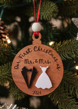 Load image into Gallery viewer, Celebrate your first holiday season as a married couple with a keepsake you'll treasure for years to come! Our Our First Christmas Married Ornament is a sweet way to remember that very special first Christmas together after saying “I do.”