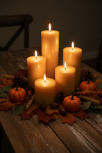 Load image into Gallery viewer, Classic 3" round beeswax pillar candles, available in 5 sizes (select size and quantity from drop down menus when ordering). These bright glowing pillars will fill the air with a natural hint of warm, fresh honey, purifying your air all the while. A favorite for housewarming gifts, these handmade candles are perfect for your needs and have a very long burn time! 