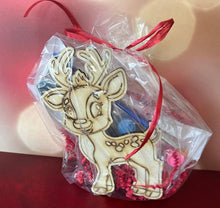 Load image into Gallery viewer, Keep the littles busy this year with these fun Christmas Paint Kits featuring your choice of a Reindeer, Santa, a Snowman or a Christmas Dragon.  Masking is left on wood design to help children with painting them.  Peel each part before painting.