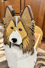 Load image into Gallery viewer, Welcome friends and family with this beautiful handcrafted Sheltie (Shetland Sheepdog) Planter Box! This charming decorative piece is the perfect addition to your front porch, entryway, covered patio, or home décor. It's a wonderful gift for Sheltie owners, dog lovers, birthdays, housewarmings, or any special occasion.