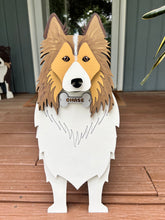 Load image into Gallery viewer, Welcome friends and family with this beautiful handcrafted Sheltie (Shetland Sheepdog) Planter Box! This charming decorative piece is the perfect addition to your front porch, entryway, covered patio, or home décor. It's a wonderful gift for Sheltie owners, dog lovers, birthdays, housewarmings, or any special occasion.