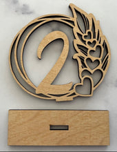 Load image into Gallery viewer, Make your wedding, anniversary, or engagement party unforgettable with these elegant table number signs. Designed to add both beauty and functionality, these signs help your guests easily find their seats while enhancing your event’s décor.