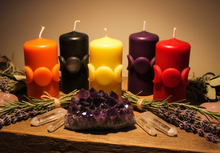 Load image into Gallery viewer, Bring a little magic into your home with this enchanting Moon Phase Beeswax Candle, featuring the Triple Goddess symbol surrounded by the colors of the seven chakras. Representing intuition, balance, feminine energy, and spiritual connection, this beautifully detailed candle is perfect for anyone drawn to Wiccan, Pagan, or mystical traditions.