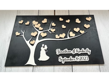 Load image into Gallery viewer, Our Exquisite Wedding Guest Book Alternative – the perfect way to capture and cherish the memories of your special day! This beautifully crafted 12" x 19" plaque is a unique addition to your wedding, offering a treasured keepsake that celebrates your love in a personalized and memorable way. A stunning image of the wedding couple, elegantly displayed alongside their names and wedding date is the focal point of your keepsake