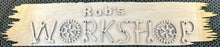 Load image into Gallery viewer, welcome one and all to your creative haven and personalize this sign with your favorite craftsman's name prominently displayed at the top. Crafted with care, this sign is more than just an entrance statement; it's a celebration of your passion for creating.  The workshop letters are uniquely formed from an array of tools, adding a whimsical touch that speaks directly to the heart of every craftsman.