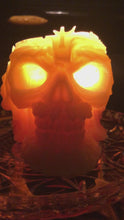Load and play video in Gallery viewer, This creepy skull with cross crown beeswax candle is sure to be a hit with your goth or Halloween loving friends.  Adds the perfect touch to Halloween decor.  This cryptic, gothic candle is great for Halloween decorations, gifts for skull loving friends, gothic decor, fall decor or just scary decor.