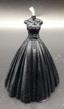 Load image into Gallery viewer, This elegant wedding / quinceanera dress silhouette beeswax candle with a lace top and flowing wedding gown bottom now in BLACK is perfect for Halloween weddings, Gothic weddings, wedding showers, wedding rehearsal dinners, quinceanera celebrations or gifts.  Picture these beautiful candles at each of the wedding shower or rehearsal dinner tables ready for the evenings events. Or use as a fun and elegant gift bag item for wedding party members. Guaranteed to make a lasting impression!