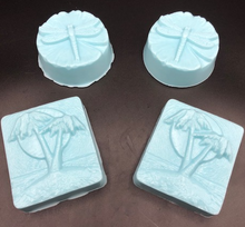Load image into Gallery viewer, Our Ocean Dreams Gift Basket is filled with soaps and a Whale Beeswax Candle that transport you right back to the beach while you watch the waves & the whales breach.  Imagine the soft sand beneath your feet as the soft glow of our beeswax candle relaxes your stresses away.  The lingering scent of our Ocean Breeze Soaps tantalize your senses to make the dream complete.   Ocean Dreams Gift Basket all packaged ready for your gift giving needs. Perfect for birthday gifts, Christmas gifts or just to let someone
