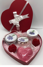 Load image into Gallery viewer, Unique Valentines Day Gift in red, heart shaped gift box. Set includes 1 Lavender Body Butter, 1 Lavender Lotion Bar, 1 Lavender Bath Bomb, 1 Lavender or Rose Geranium scented Heart Shaped Goat's Milk Soap & 2 Beeswax Red Rose Ball Candles. Perfect for Valentines Day Gifts!