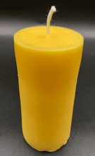 Load image into Gallery viewer, Leaf design beeswax candle. Leaf design on front of this candle shown with green sparkle mica leaf.
