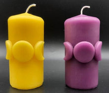 Load image into Gallery viewer, Moon Phase Beeswax Candle depicting the triple Goddess. Bring a bit of magic into your life with this amazing candle! Available in natural yellow beeswax, purple beeswax or black beeswax with silver moons.